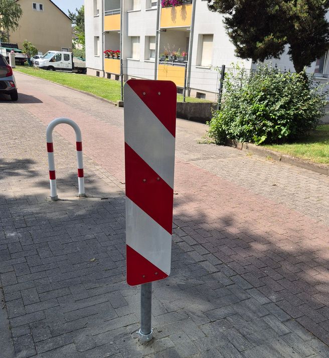 Parkplatzklau durch Bügelbau.